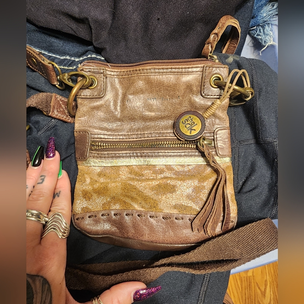 The Sak brown small crossbody purse. GUC.